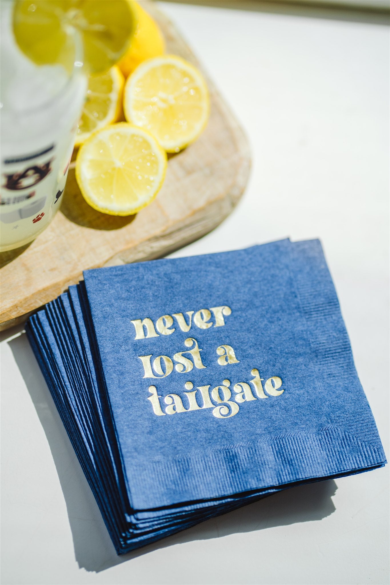 Gold Foil + Navy "Never Lost a Tailgate" Napkin Pack