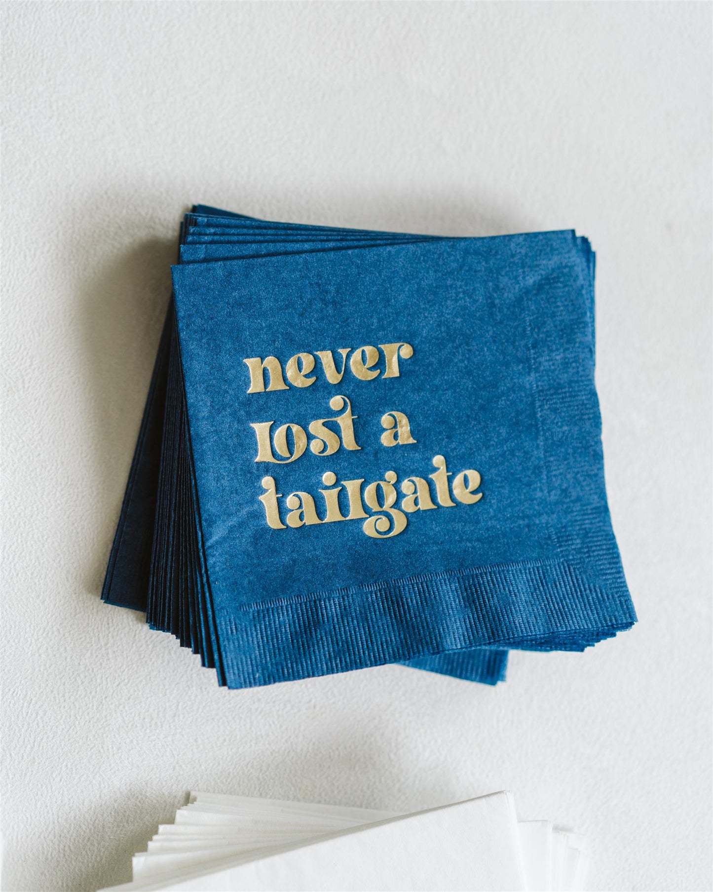 Gold Foil + Navy "Never Lost a Tailgate" Napkin Pack