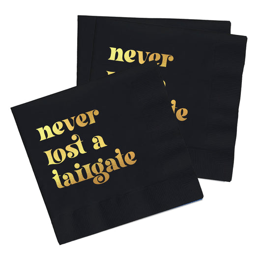 "Never Lost a Tailgate" gold foil + black napkin pack